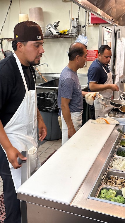 DeVino's kitchen team preparing orders